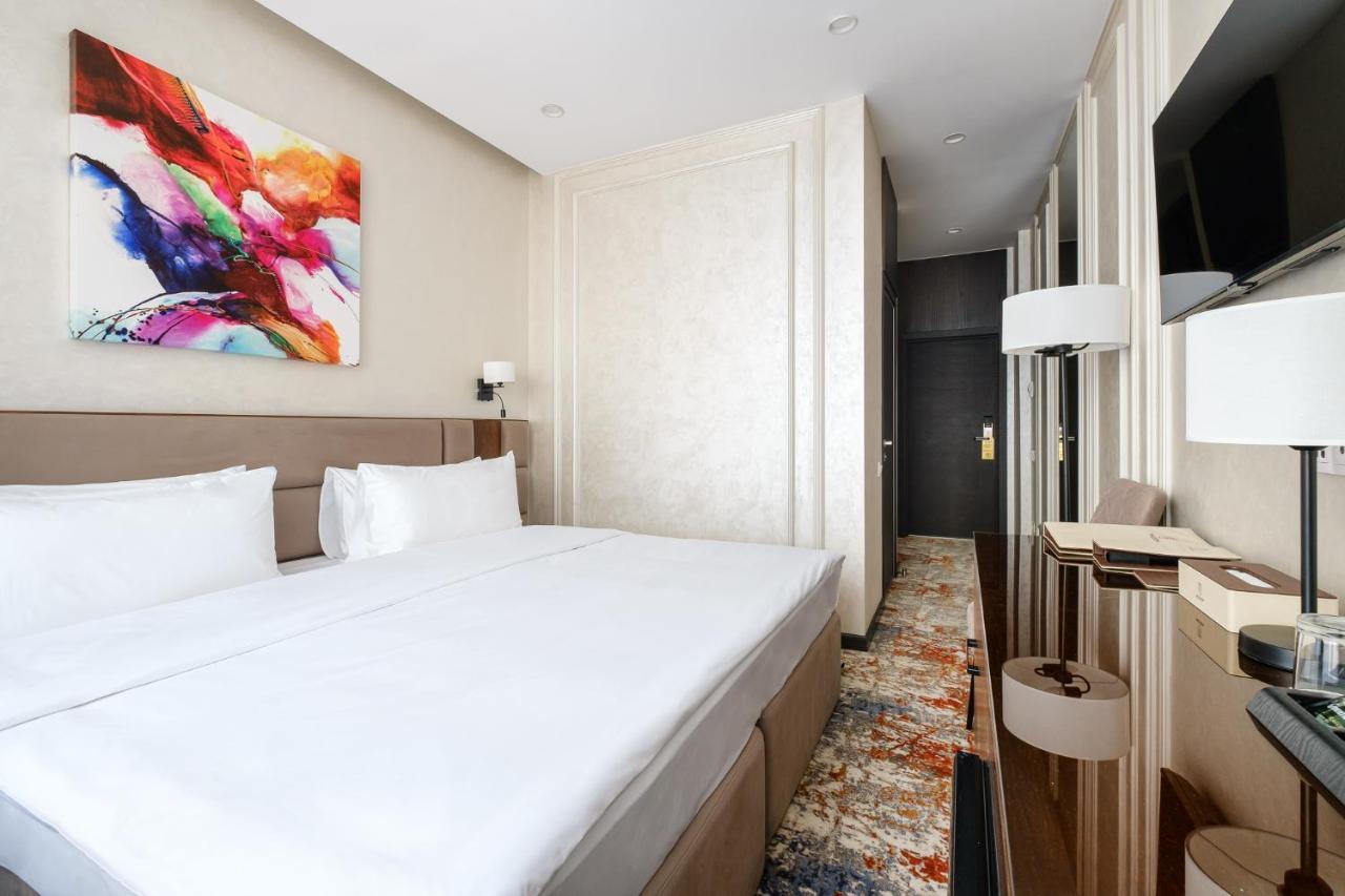 Grand Mildom Hotel อัลมาตี ภายนอก รูปภาพ
