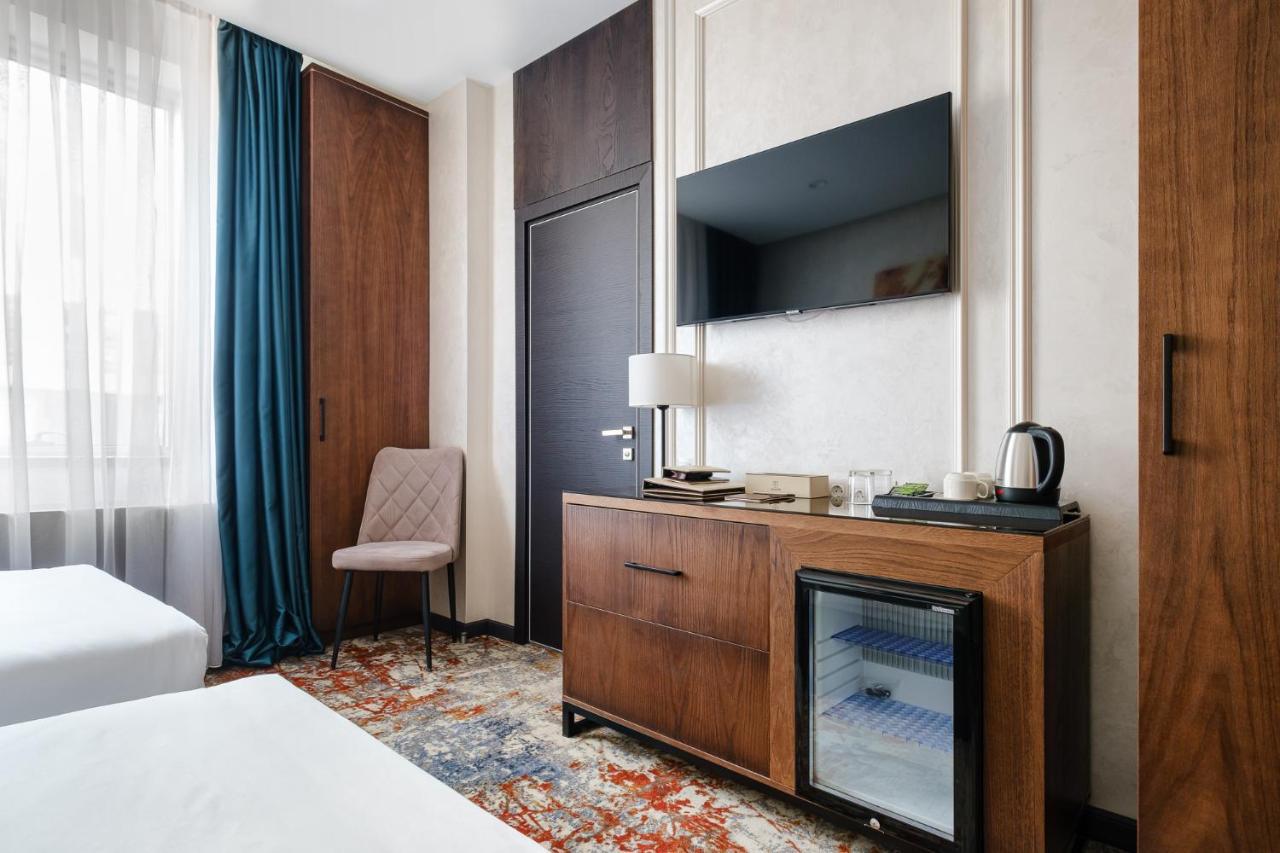 Grand Mildom Hotel อัลมาตี ภายนอก รูปภาพ