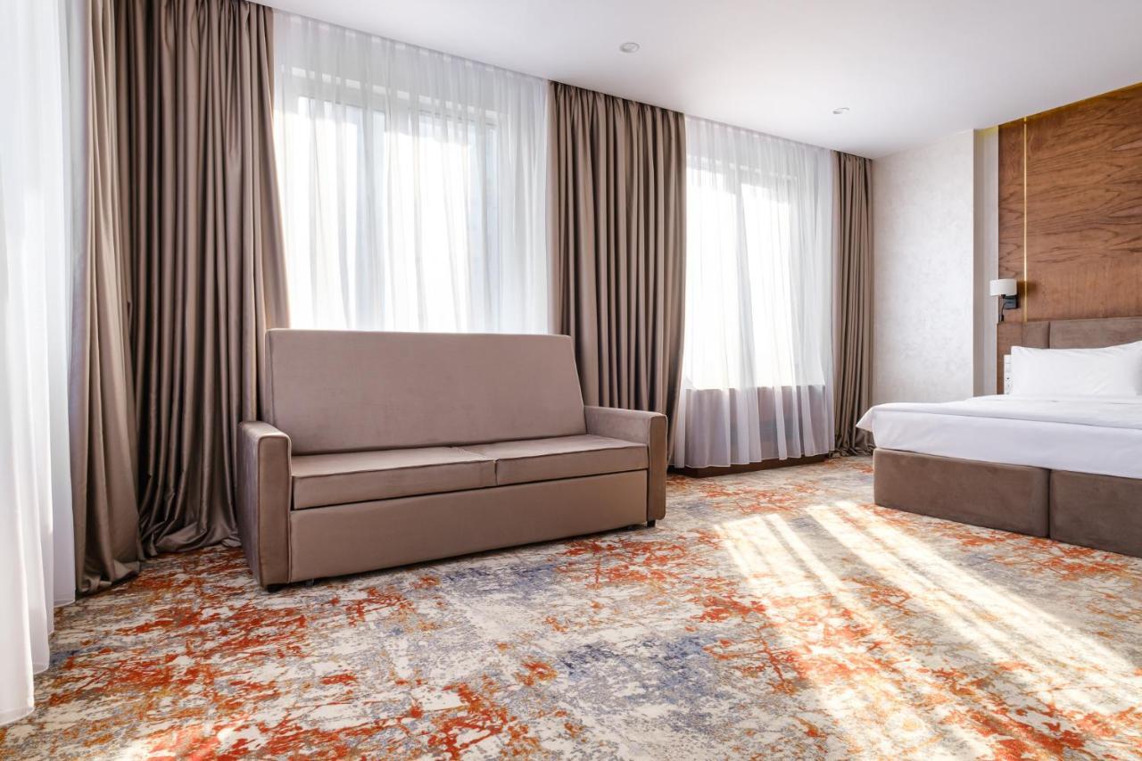 Grand Mildom Hotel อัลมาตี ภายนอก รูปภาพ