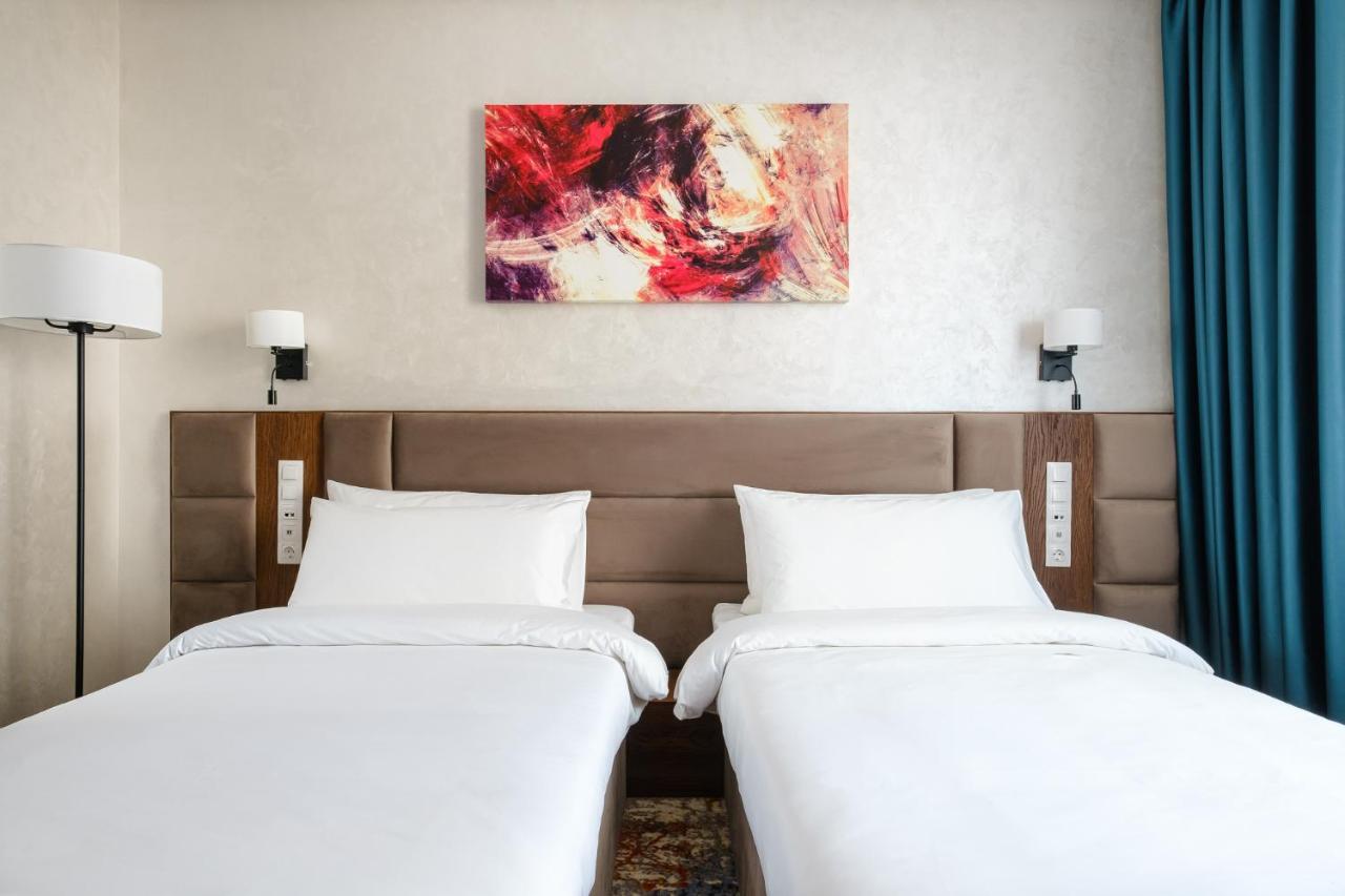 Grand Mildom Hotel อัลมาตี ภายนอก รูปภาพ