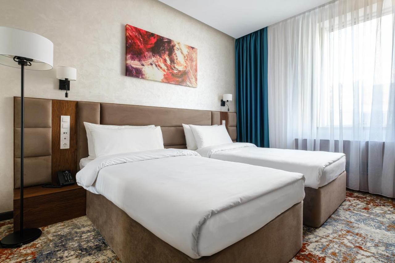 Grand Mildom Hotel อัลมาตี ภายนอก รูปภาพ