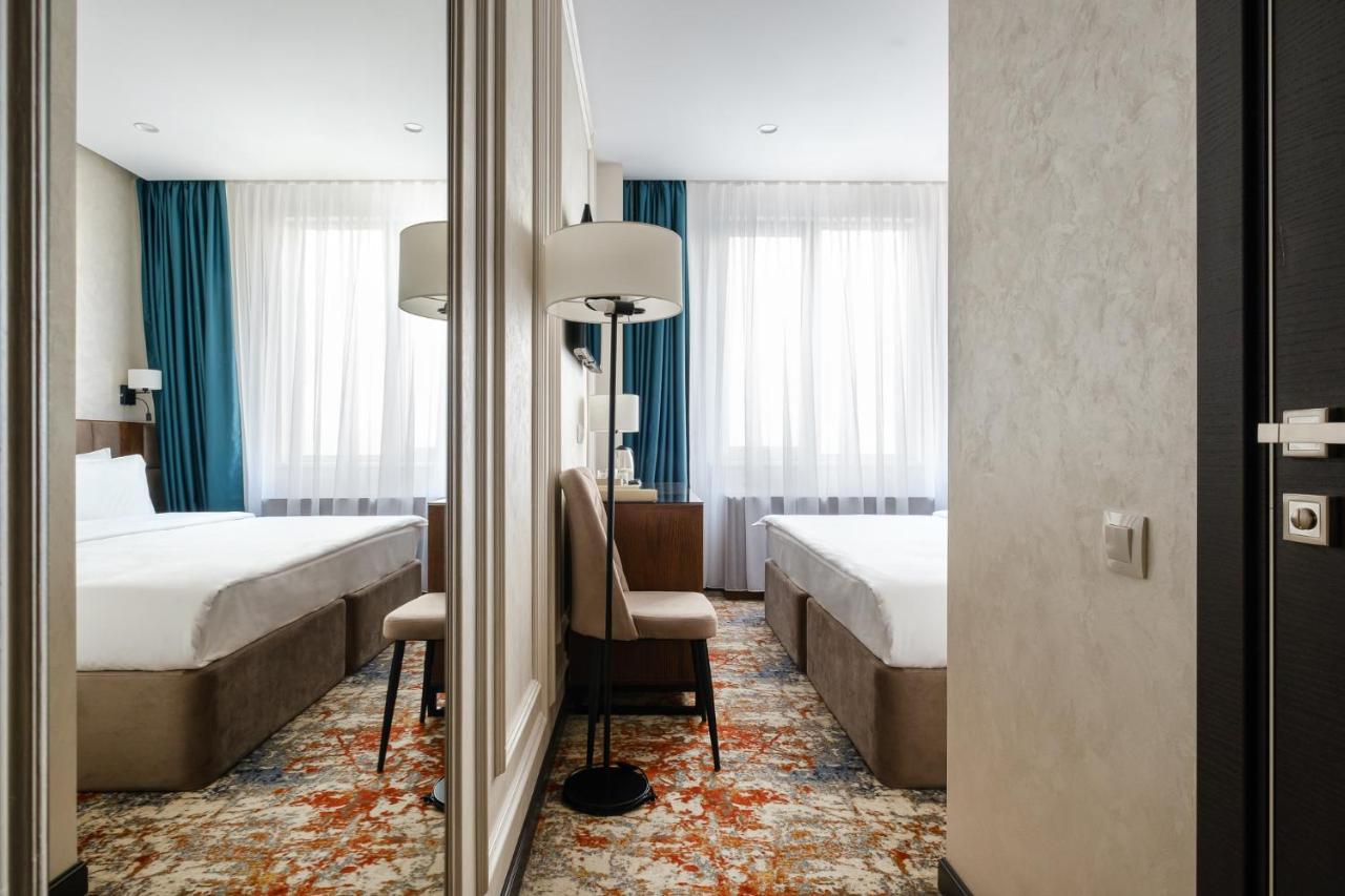 Grand Mildom Hotel อัลมาตี ภายนอก รูปภาพ